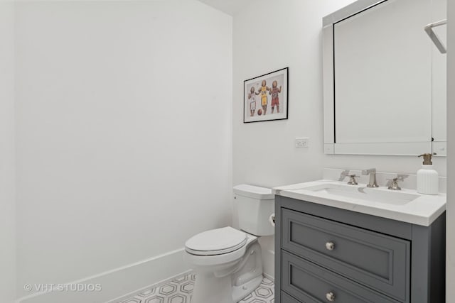 1963 N Dayton St, Chicago, IL 60614 - bathroom with toilet, vanity, baseboards, and tile patterned floors