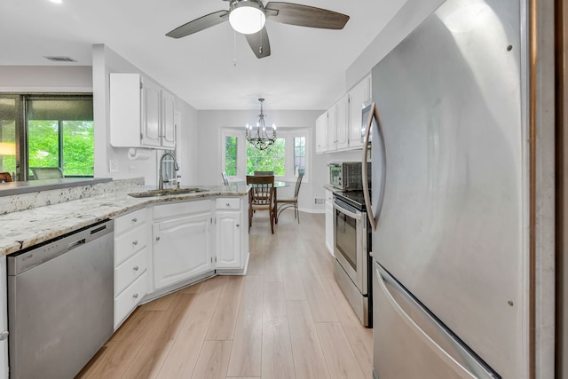 13253 S Oak Ridge Trl Unit 2B, Palos Heights, IL 60463 - kitchen featuring stainless steel appliances, a sink, and white cabinetry