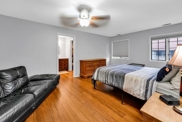 13253 S Oak Ridge Trl Unit 2B, Palos Heights, IL 60463 - bedroom with light wood-style flooring and ceiling fan