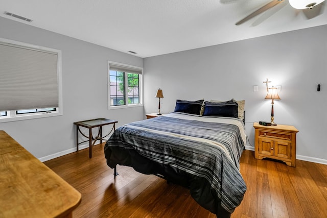13253 S Oak Ridge Trl Unit 2B, Palos Heights, IL 60463 - bedroom featuring wood-type flooring, baseboards, and ceiling fan