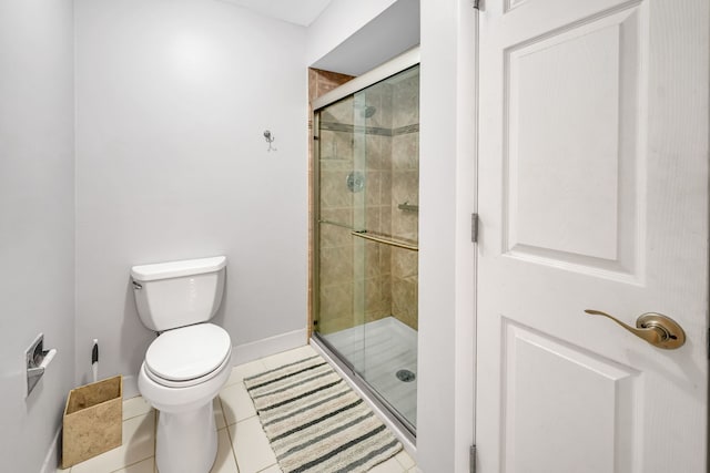 13253 S Oak Ridge Trl Unit 2B, Palos Heights, IL 60463 - full bath featuring toilet, a stall shower, tile patterned flooring, and baseboards