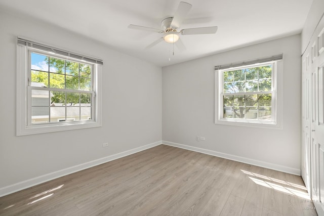 1206 Spur Ct Unit 1206, Wheeling, IL 60090 - unfurnished room featuring light wood-type flooring, baseboards, and a ceiling fan