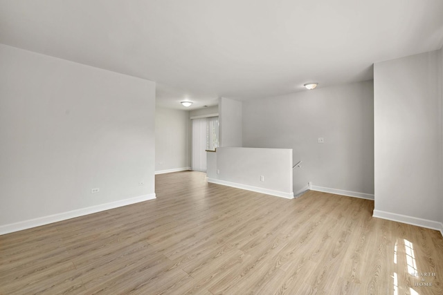 1206 Spur Ct Unit 1206, Wheeling, IL 60090 - unfurnished room with light wood finished floors and baseboards