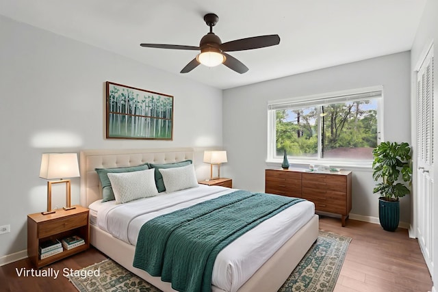 2311 183rd St Unit 203, Homewood, IL 60430 - bedroom with light wood-style floors and ceiling fan
