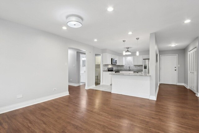 2311 183rd St Unit 203, Homewood, IL 60430 - unfurnished living room featuring recessed lighting and wood finished floors