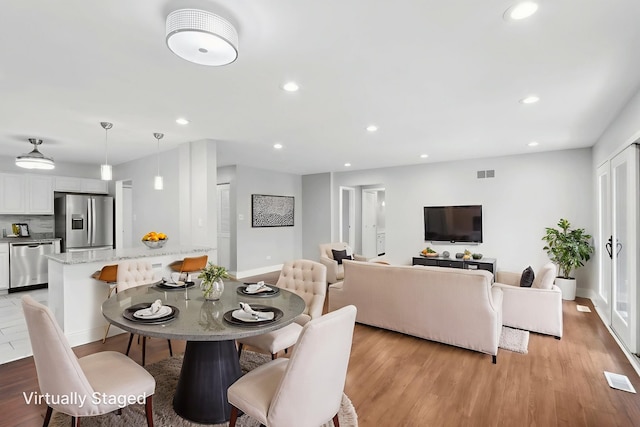 2311 183rd St Unit 203, Homewood, IL 60430 - dining area featuring light wood-style floors and recessed lighting