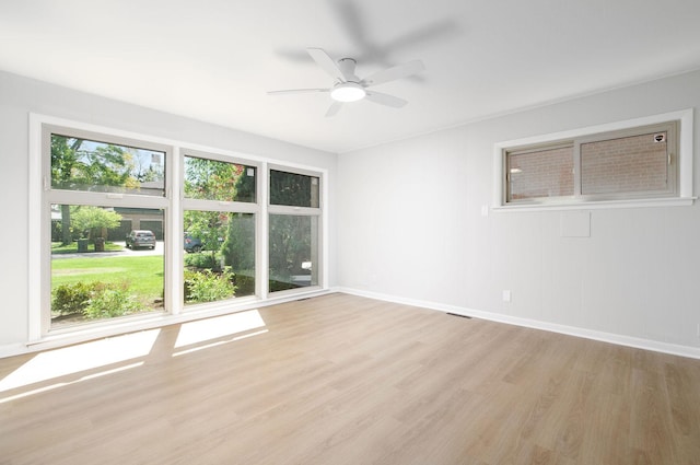9140 Keystone Ave, Skokie, IL 60076 - empty room featuring light wood-style floors, ceiling fan, and baseboards
