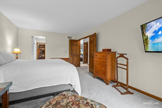 312 Dunham Place Commons Unit 312, Saint Charles, IL 60174 - bedroom with light carpet and baseboards