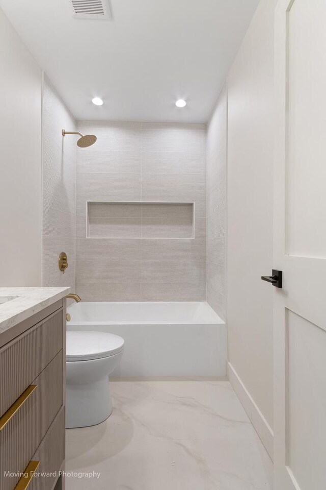 611 S Fern Ave, Elmhurst, IL 60126 - bathroom with bathing tub / shower combination, toilet, vanity, and recessed lighting