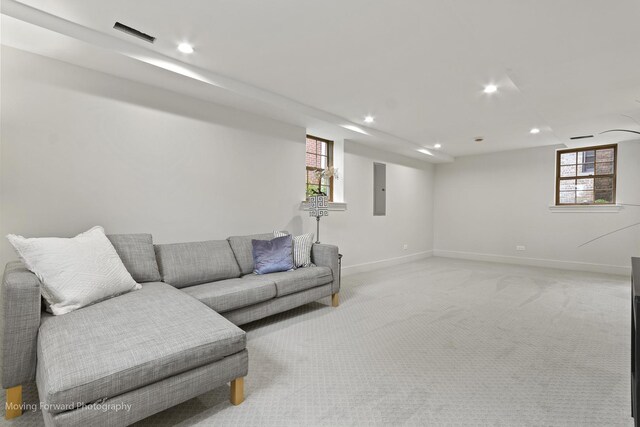 611 S Fern Ave, Elmhurst, IL 60126 - living area featuring baseboards, plenty of natural light, light carpet, recessed lighting, and electric panel