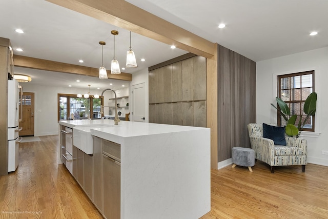 611 S Fern Ave, Elmhurst, IL 60126 - kitchen featuring light countertops, modern cabinets, light wood-type flooring, baseboards, and recessed lighting