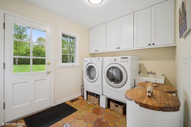 706 Tanglewood Ct, Lake Forest, IL 60045 - washroom featuring cabinet space, washing machine and clothes dryer, baseboards, and light tile patterned floors