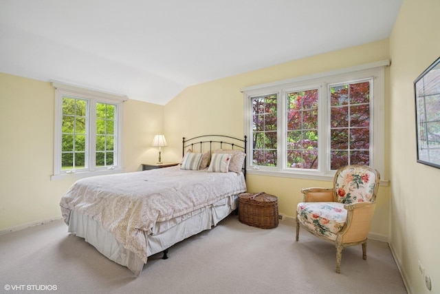 706 Tanglewood Ct, Lake Forest, IL 60045 - bedroom with carpet flooring, multiple windows, baseboards, and vaulted ceiling