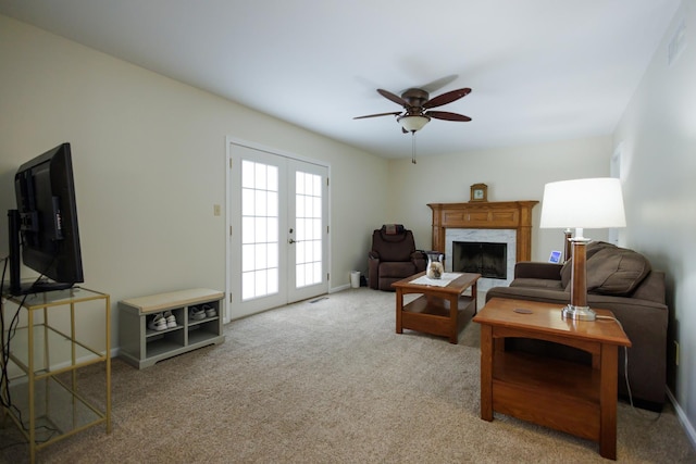 358 Princeton Ave, Bourbonnais, IL 60914 - carpeted living area with ceiling fan, a high end fireplace, french doors, and baseboards