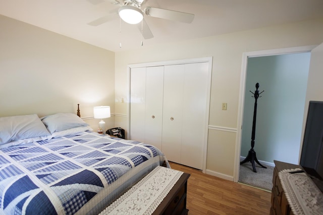 358 Princeton Ave, Bourbonnais, IL 60914 - bedroom with light wood-style floors, a closet, a ceiling fan, and baseboards