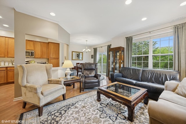 31786 N Pineview Blvd, Lakemoor, IL 60051 - living room with a chandelier, light wood-style floors, recessed lighting, and crown molding