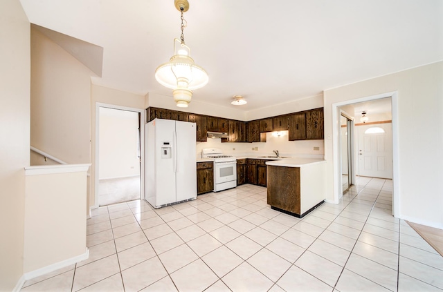 15108 Sunset Ridge Dr, Orland Park, IL 60462 - kitchen featuring white appliances, dark brown cabinetry, light countertops, a sink, and under cabinet range hood