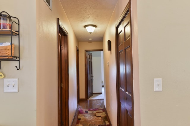 300 N Elm St, Odell, IL 60460 - hall featuring a textured ceiling and baseboards