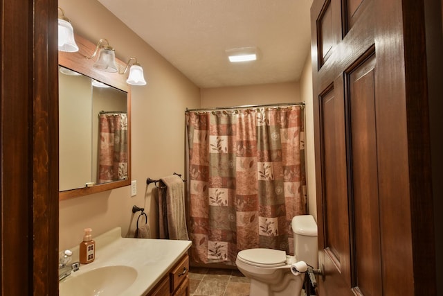 300 N Elm St, Odell, IL 60460 - full bath with toilet, vanity, and a shower with shower curtain