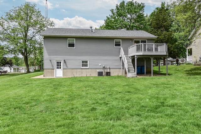 300 N Elm St, Odell, IL 60460 - rear view of property featuring a deck, stairway, a lawn, and central AC unit