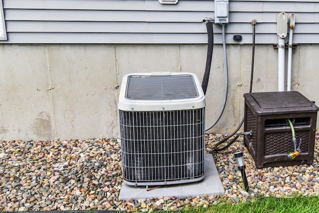300 N Elm St, Odell, IL 60460 - exterior view of central air condition unit