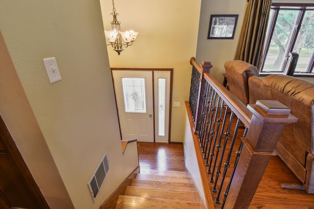 300 N Elm St, Odell, IL 60460 - entryway featuring a chandelier, wood finished floors, and baseboards