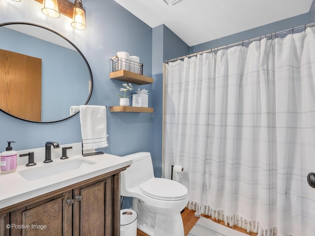 1000 Surrey Ln, Itasca, IL 60143 - bathroom with toilet, vanity, wood finished floors, and a shower with shower curtain