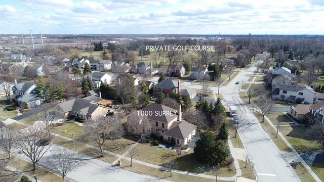 1000 Surrey Ln, Itasca, IL 60143 - aerial view of property and surrounding area featuring nearby suburban area