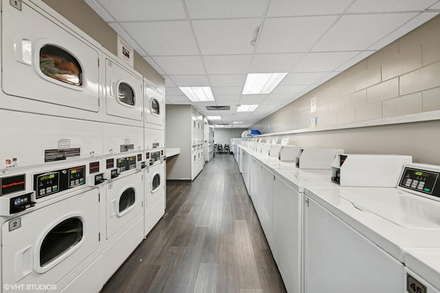 1560 N Sandburg Ter Unit 3506J, Chicago, IL 60610 - community laundry room featuring stacked washer and clothes dryer, separate washer and dryer, and dark wood-style floors