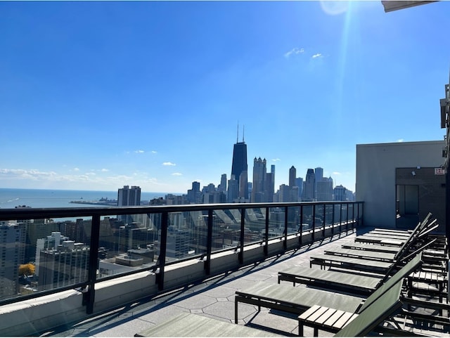 1560 N Sandburg Ter Unit 3506J, Chicago, IL 60610 - balcony featuring a view of skyline and a water view