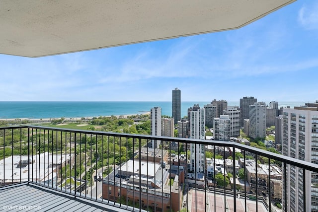 1560 N Sandburg Ter Unit 3506J, Chicago, IL 60610 - balcony with a water view and a city view