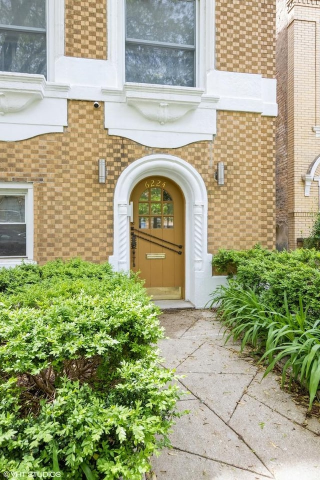 6224 N Washtenaw Ave Unit 2, Chicago, IL 60659 - doorway to property with brick siding