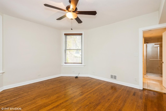 6224 N Washtenaw Ave Unit 2, Chicago, IL 60659 - unfurnished room featuring wood finished floors, a ceiling fan, and baseboards
