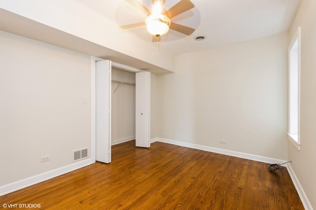 6224 N Washtenaw Ave Unit 2, Chicago, IL 60659 - unfurnished bedroom with wood finished floors, baseboards, a closet, and a ceiling fan