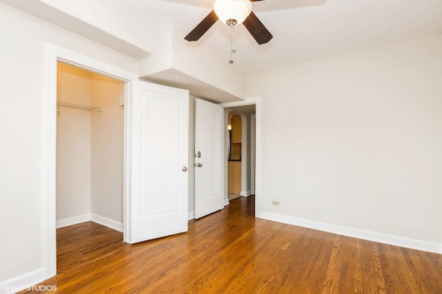 6224 N Washtenaw Ave Unit 2, Chicago, IL 60659 - unfurnished bedroom featuring wood finished floors, baseboards, a closet, and ceiling fan