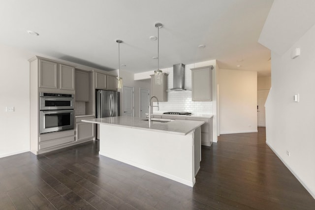 515 Watercress Dr, Aurora, IL 60504 - kitchen featuring gray cabinetry, wall chimney exhaust hood, appliances with stainless steel finishes, tasteful backsplash, and dark wood-style floors