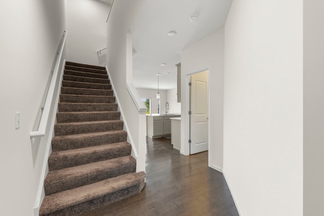 515 Watercress Dr, Aurora, IL 60504 - stairs featuring wood finished floors and baseboards