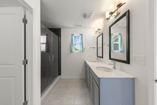 515 Watercress Dr, Aurora, IL 60504 - bathroom with double vanity, a shower stall, and tile patterned floors