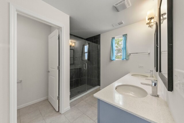 515 Watercress Dr, Aurora, IL 60504 - full bathroom featuring double vanity, a shower stall, and tile patterned flooring