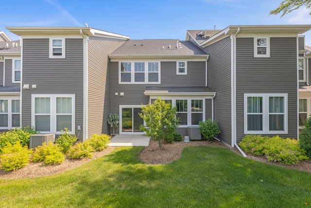 515 Watercress Dr, Aurora, IL 60504 - rear view of house featuring a lawn and a patio area