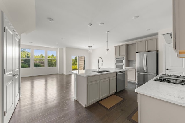 515 Watercress Dr, Aurora, IL 60504 - kitchen with stainless steel appliances, dark wood-type flooring, open floor plan, a kitchen island with sink, and recessed lighting