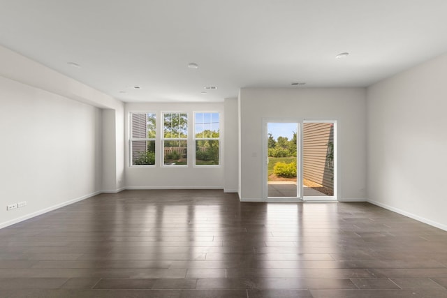 515 Watercress Dr, Aurora, IL 60504 - empty room with dark wood-type flooring and baseboards