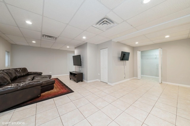 1237 Bradley Cir, Elgin, IL 60123 - living room with recessed lighting, light tile patterned floors, baseboards, and a drop ceiling
