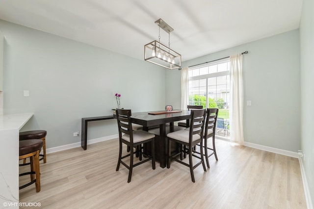 1237 Bradley Cir, Elgin, IL 60123 - dining space featuring light wood-type flooring and baseboards