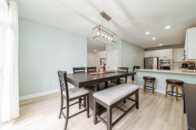 1237 Bradley Cir, Elgin, IL 60123 - dining space with light wood-style floors, recessed lighting, and baseboards