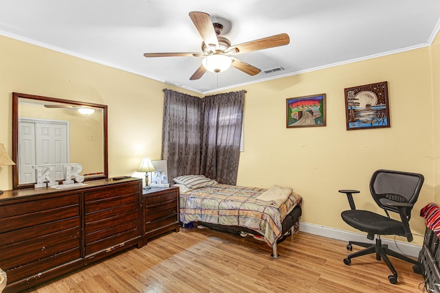 336 Niagara St, Park Forest, IL 60466 - bedroom with light wood-style floors, ornamental molding, baseboards, and ceiling fan