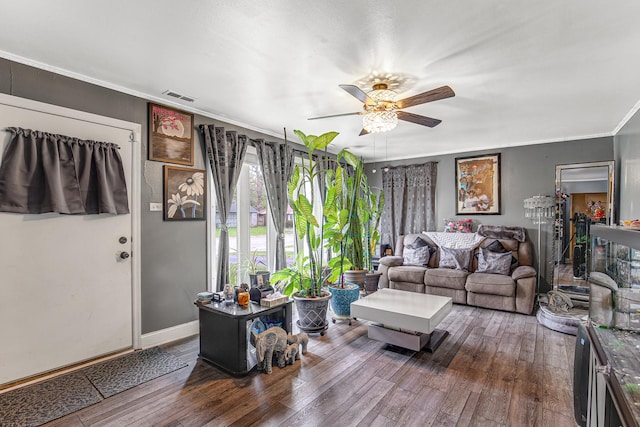 336 Niagara St, Park Forest, IL 60466 - living area featuring a ceiling fan, wood-type flooring, crown molding, and baseboards