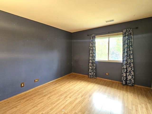 2 Oak Creek Dr Unit 3207, Buffalo Grove, IL 60089 - unfurnished room with wood finished floors and baseboards