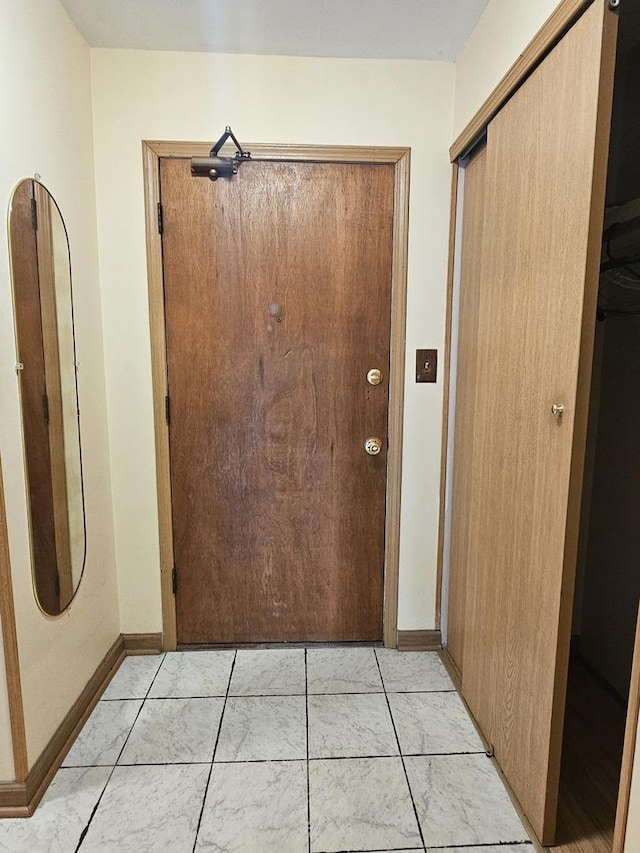 2 Oak Creek Dr Unit 3207, Buffalo Grove, IL 60089 - doorway to outside featuring baseboards