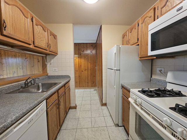 2 Oak Creek Dr Unit 3207, Buffalo Grove, IL 60089 - kitchen with white appliances, a sink, brown cabinets, backsplash, and dark countertops
